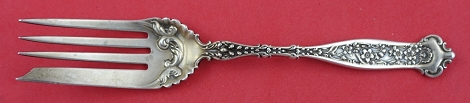 Fish Fork w/ rococo design above tines 6 1/2